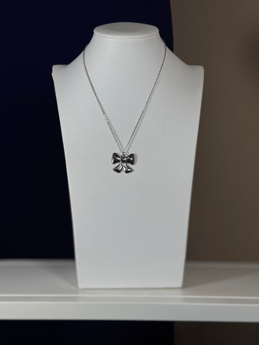 Collana con dettaglio fiocco argento/oro